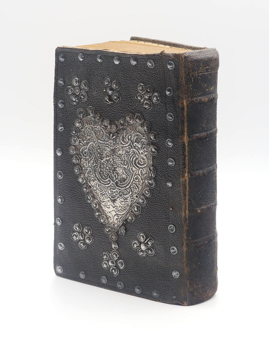 ELABORATE BINDING WITH METAL FURNITURE